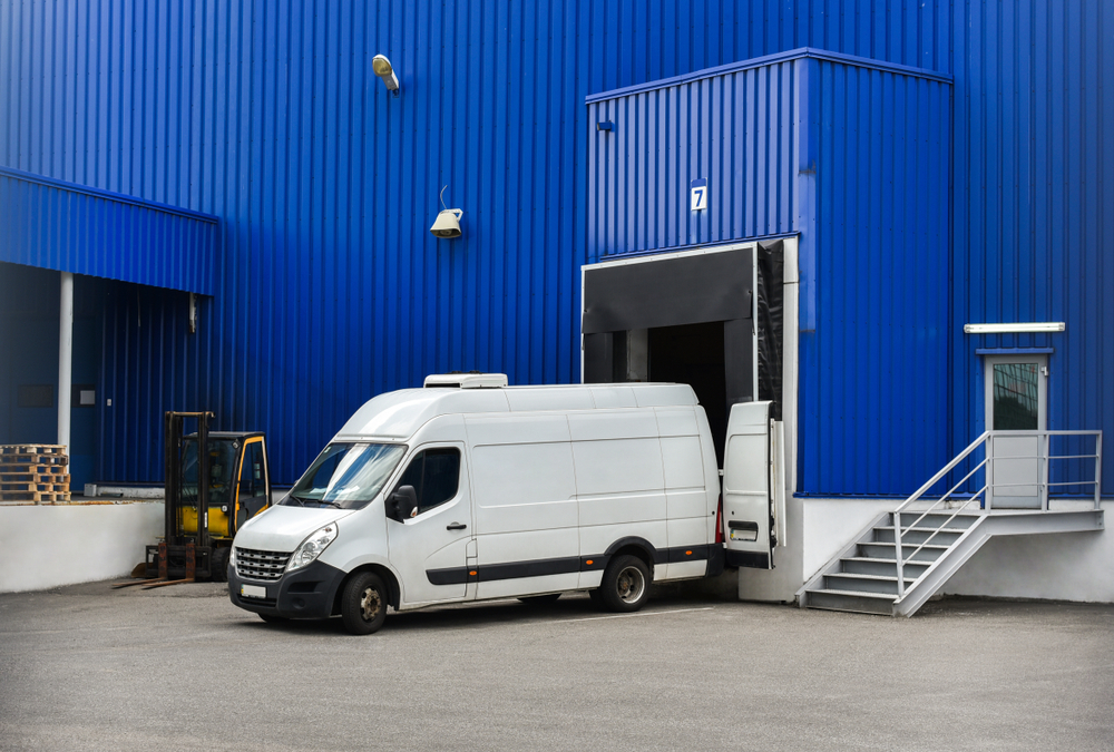 van courier unloading to depot
